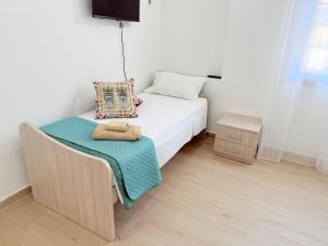 Postel nebo postele na pokoji v ubytování Casa Ferrante