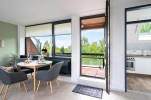 Rõdu või terrass majutusasutuses Ferienwohnung Weitblick am Meer
