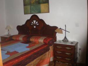 Postel nebo postele na pokoji v ubytování Apartamentos Rurales El Cañuelo de Carcabuey