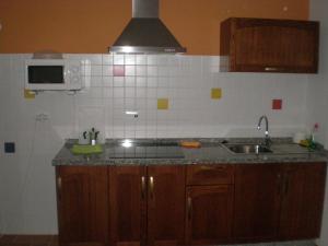 Kuchyň nebo kuchyňský kout v ubytování Apartamentos Rurales El Cañuelo de Carcabuey
