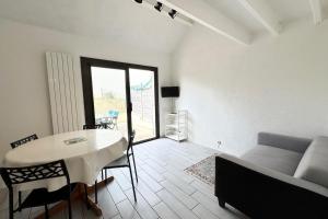 Posezení v ubytování Détente en famille Maison 2ch & pisicine