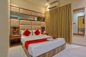 Postel nebo postele na pokoji v ubytování Meriton Buisness Hotel Mumbai International airport T-2 + 31 fotografií