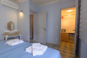 Posteľ alebo postele v izbe v ubytovaní Fani's Komi Apartments