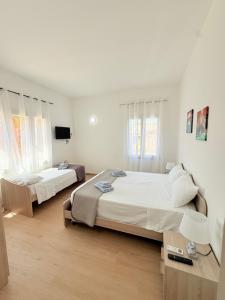 Postel nebo postele na pokoji v ubytování Casa Ferrante