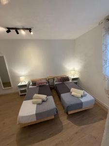 Letto o letti in una camera di The Lemon Tree