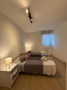 Letto o letti in una camera di The Lemon Tree