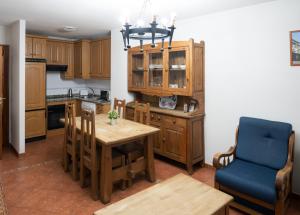 Kuchyňa alebo kuchynka v ubytovaní Panther Home Apartamentos Anita