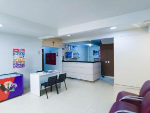 Kuchyň nebo kuchyňský kout v ubytování Hotel Colina