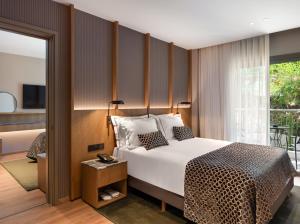 Postel nebo postele na pokoji v ubytování Pendeli Resort