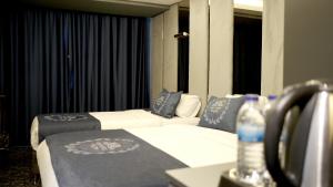 Posteľ alebo postele v izbe v ubytovaní BÇ Ruby Hotel