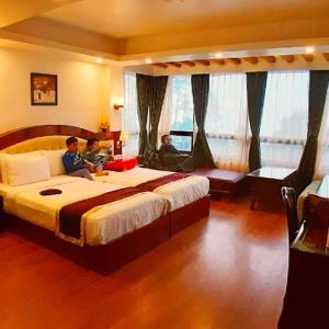 Postel nebo postele na pokoji v ubytování The Yakha Retreat + 7 fotografií