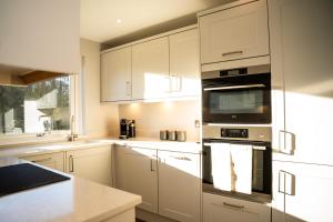 Køkken eller tekøkken på 28 Guthrie Court - Luxury Apartment + 4 billeder