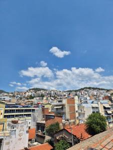 a view of a city with buildings at Urban Roof Studio in Kavala