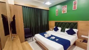 Postel nebo postele na pokoji v ubytování Hotel Suncity