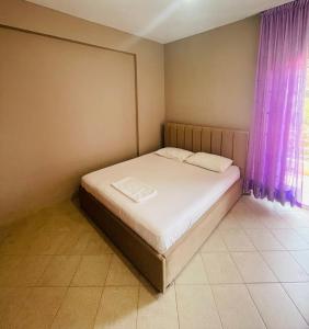 Postel nebo postele na pokoji v ubytování Bleta Rooms