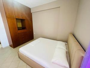 Postel nebo postele na pokoji v ubytování Bleta Rooms