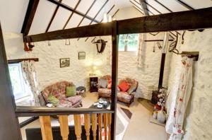 Posezení v ubytování Waterswallow Cottage