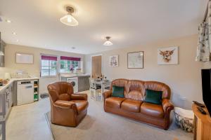 Χώρος καθιστικού στο Rose Bank Cottage
