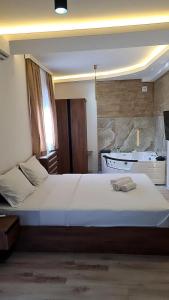 Postel nebo postele na pokoji v ubytování Aqua Apartments 2