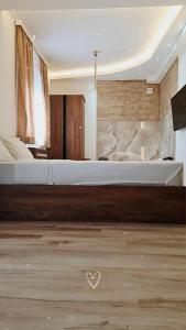 Postel nebo postele na pokoji v ubytování Aqua Apartments 2
