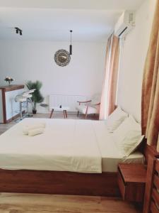 Postel nebo postele na pokoji v ubytování Aqua Apartments 2