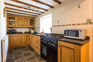 Köök või kööginurk majutusasutuses Ness Cottage