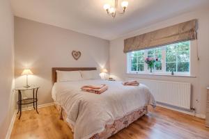 Katil atau katil-katil dalam bilik di Heather House