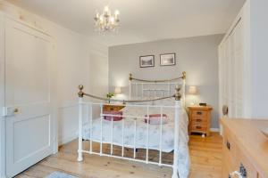 Postel nebo postele na pokoji v ubytování Ducks Cottage