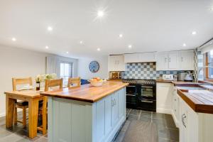 Kuchyň nebo kuchyňský kout v ubytování Ducks Cottage