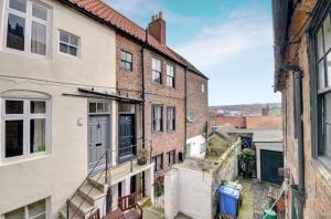 Budova, kde se prázdninový dům nachází + 6 fotografií