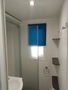 a bathroom with a glass shower and a toilet at Domaine De Dugny in Veuzain-sur-Loire