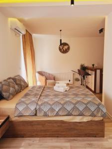 Postel nebo postele na pokoji v ubytování Aqua Apartments 2