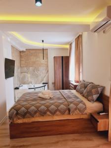 Postel nebo postele na pokoji v ubytování Aqua Apartments 2