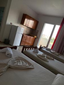 Postel nebo postele na pokoji v ubytování Hotel Armela