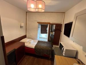 Postel nebo postele na pokoji v ubytování Gotthard Residents
