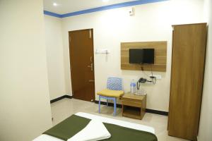 Afbeelding uit fotogalerij van Hotel New Amirtham inn in Palni