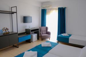 Postel nebo postele na pokoji v ubytování Hotel Palasa