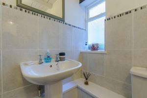 Koupelna v ubytování Alice Cottage + 18 fotografií