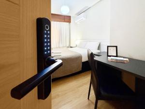 A bed or beds in a room at Pension Berceo