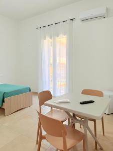 Postel nebo postele na pokoji v ubytování Casa Ferrante