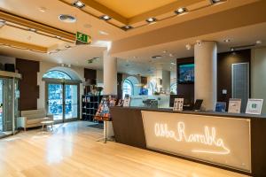 a store with a counter in the middle of a mall at Abba Rambla Hotel in Barcelona