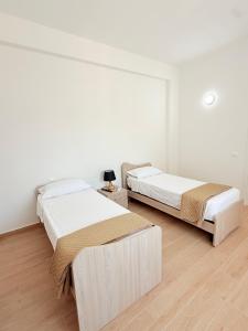 Postel nebo postele na pokoji v ubytování Casa Ferrante
