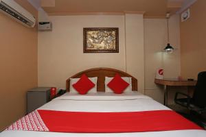 Postel nebo postele na pokoji v ubytování Hotel O Madhur Regency + 17 fotografií