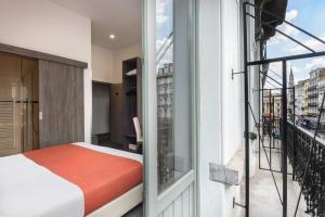 Cama o camas de una habitación en Dansaert Hotel