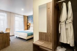 Cama o camas de una habitación en Dansaert Hotel