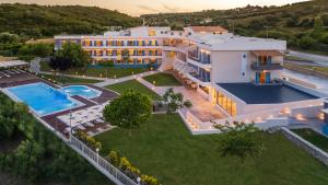 an aerial view of a villa with a swimming pool at Paradise Resort in Finikounta