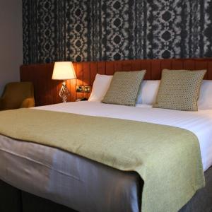 Postelja oz. postelje v sobi nastanitve Woodford Dolmen Hotel Carlow