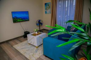 Χώρος καθιστικού στο Amazing apartment in Milimani -Kisumu