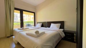 Postel nebo postele na pokoji v ubytování Kevin Aldau Heights + 33 fotografií