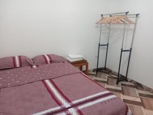 Кровать или кровати в номере Casa Vernaza - Zona residencial - Aeropuerto 5 min